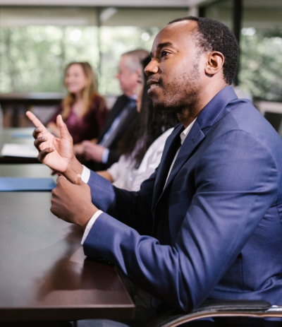 Group of Black professionals in a mentoring circle